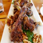 An appetizer of duck wings ordered during lunch at the Iron Goat